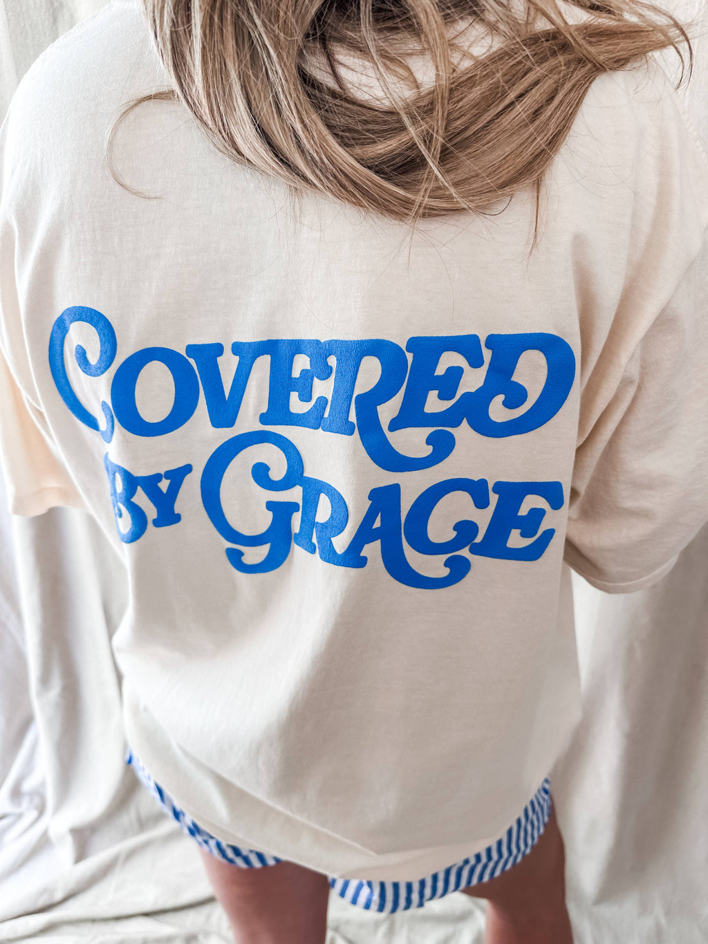 Covered By Grace blue puff- Ivory Tee: M