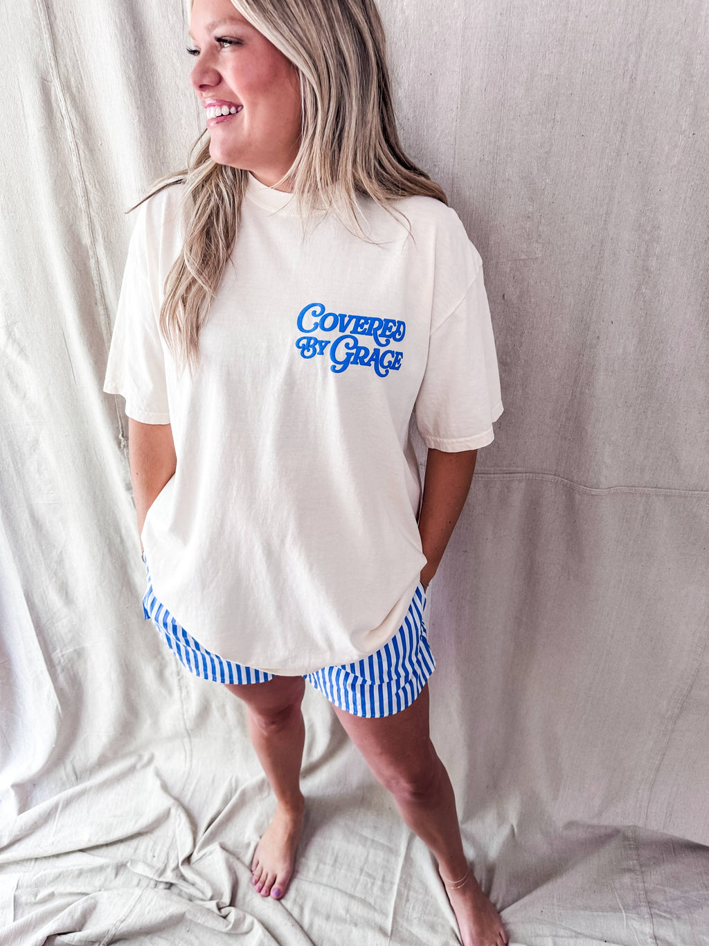 Covered By Grace blue puff- Ivory Tee: L