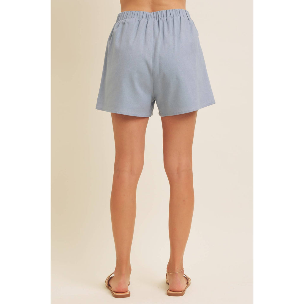 STITCHED SERENITY LINEN-BLEND EMBROIDERED SHORTS: NATURAL/BLACK / M