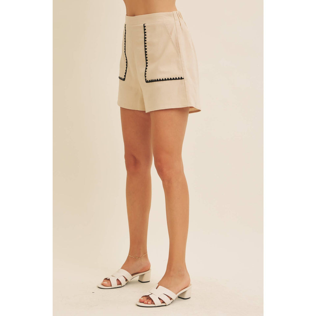 STITCHED SERENITY LINEN-BLEND EMBROIDERED SHORTS: NATURAL/BLACK / S