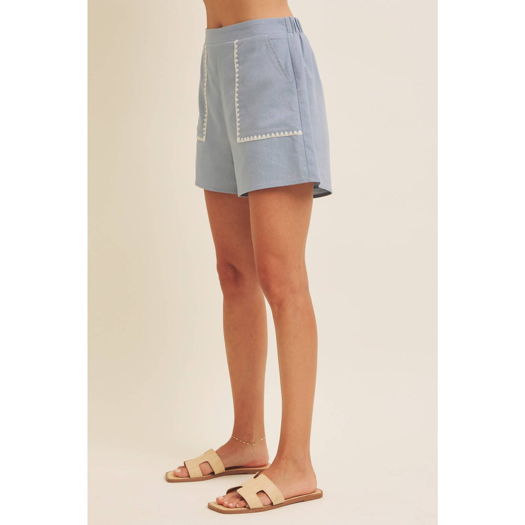 STITCHED SERENITY LINEN-BLEND EMBROIDERED SHORTS: NATURAL/BLACK / L
