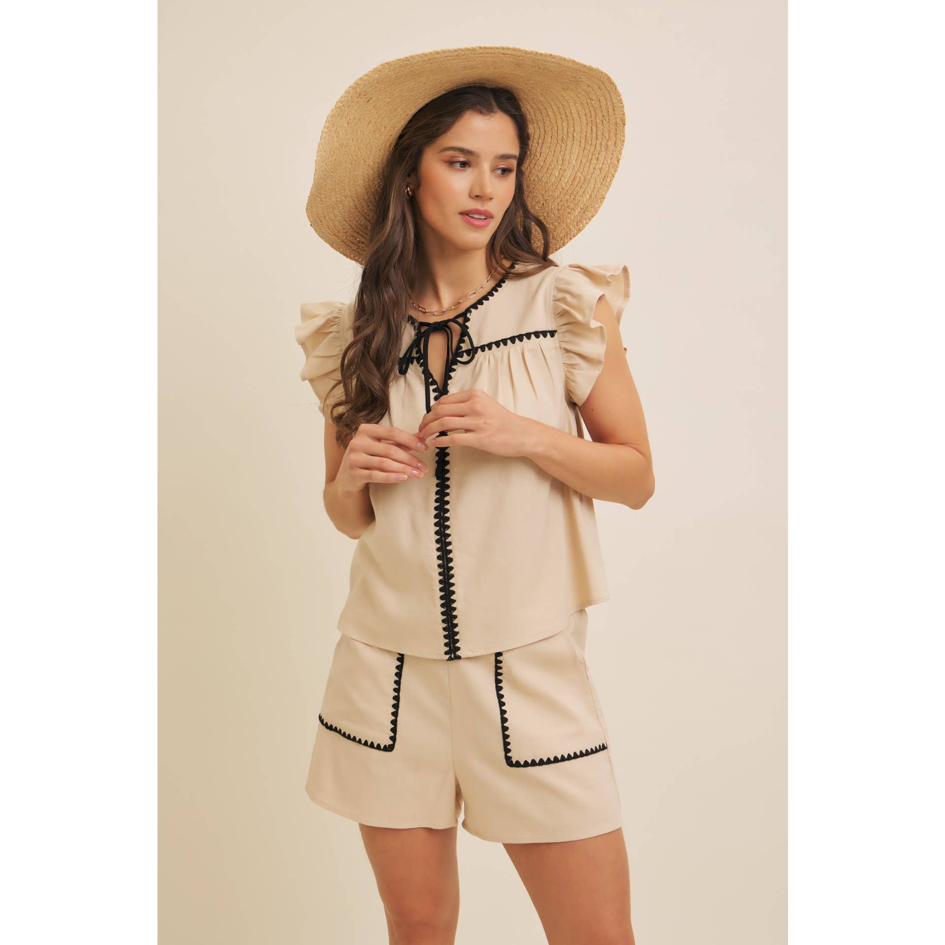 STITCHED SERENITY LINEN-BLEND EMBROIDERED SHORTS: NATURAL/BLACK / S