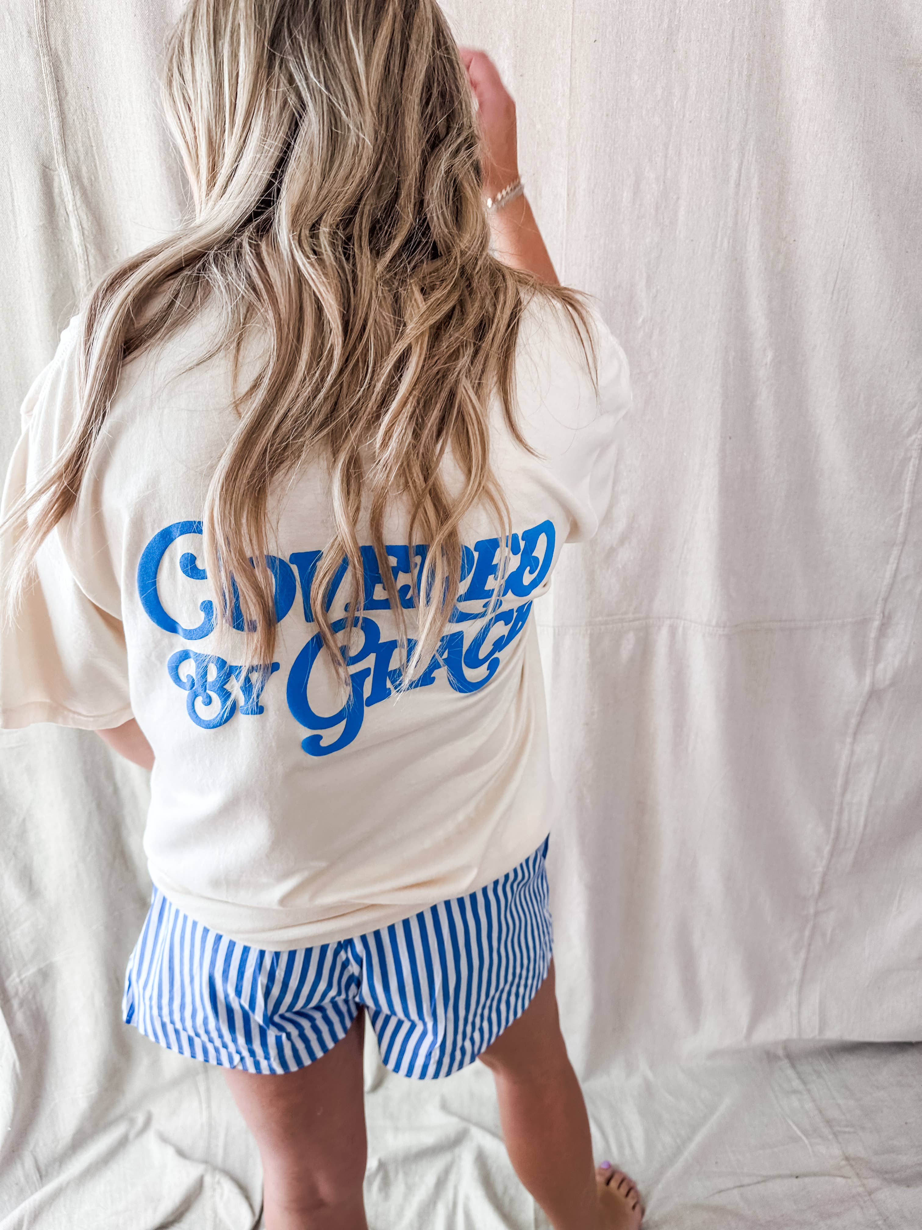 Covered By Grace blue puff- Ivory Tee: L