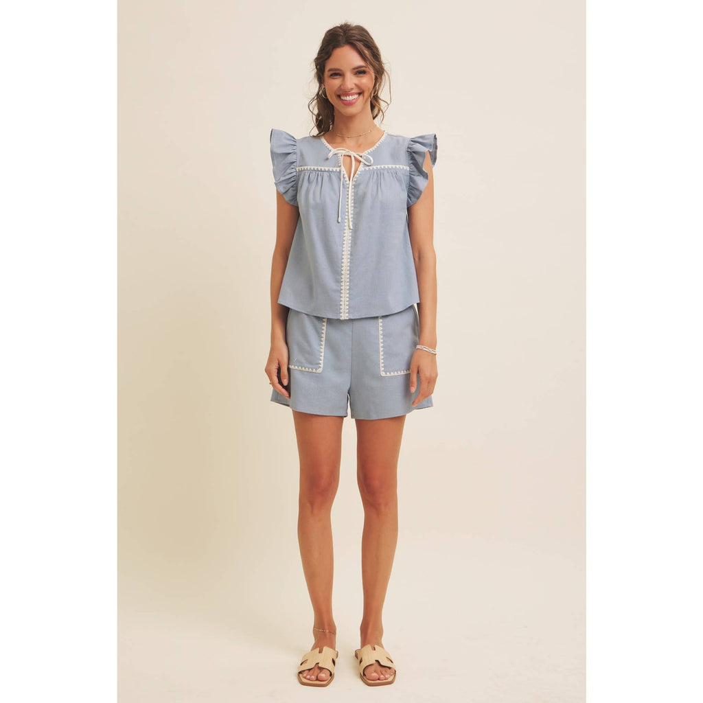 STITCHED SERENITY LINEN-BLEND EMBROIDERED SHORTS: NATURAL/BLACK / M