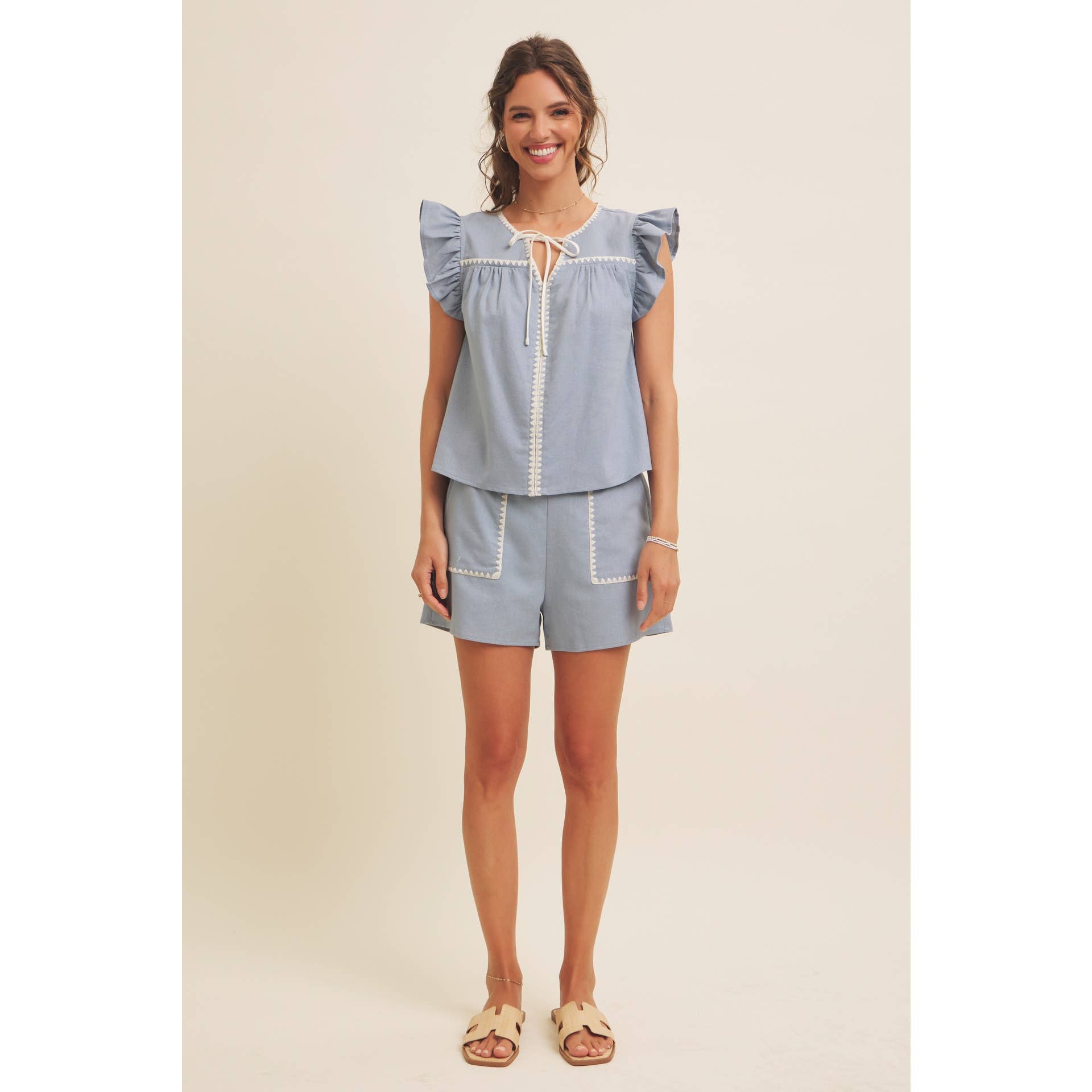 STITCHED SERENITY LINEN-BLEND EMBROIDERED SHORTS: NATURAL/BLACK / M