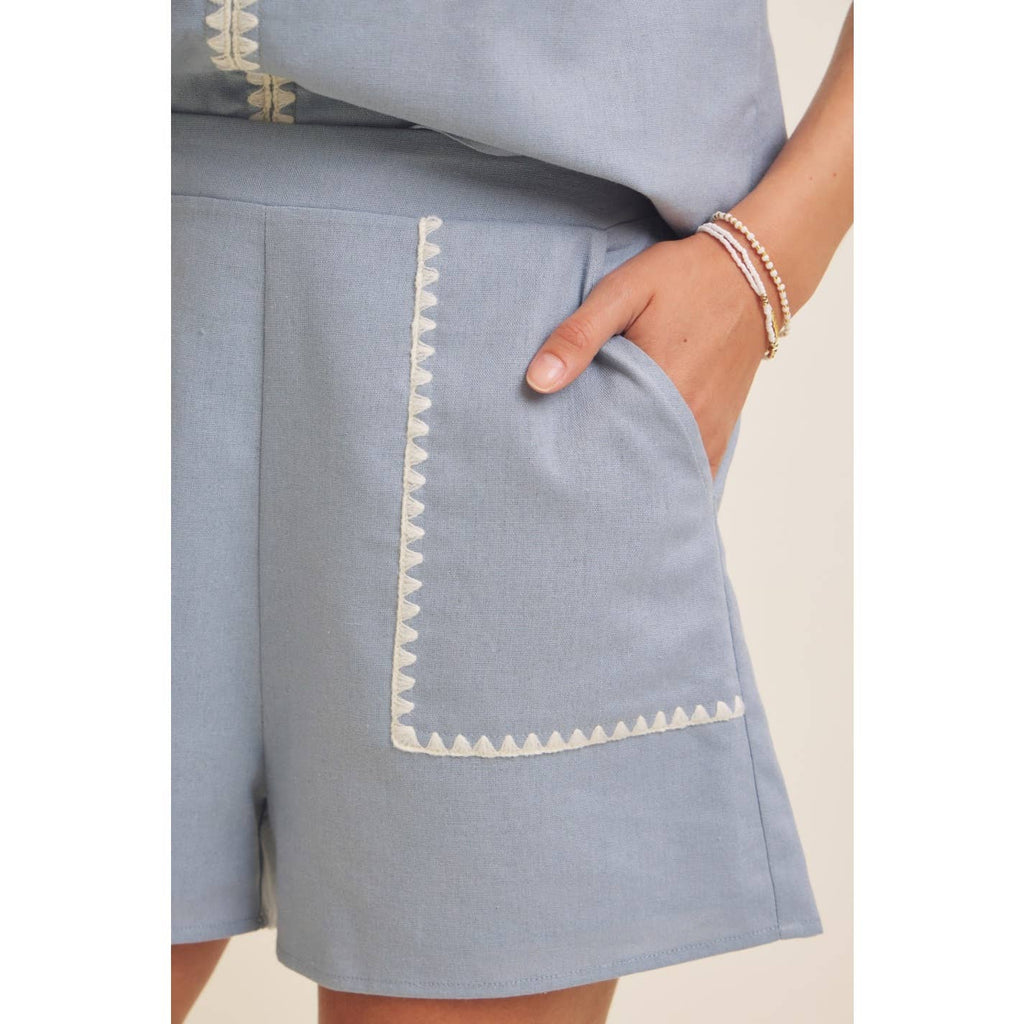 STITCHED SERENITY LINEN-BLEND EMBROIDERED SHORTS: NATURAL/BLACK / L